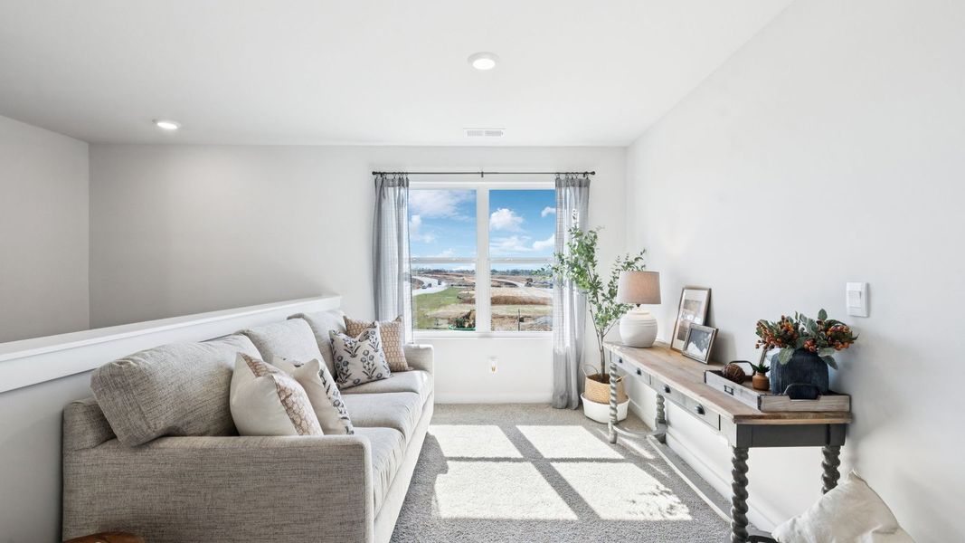 Furnished interior in a model home at Harvest Point in Spring Hill (Image 77).