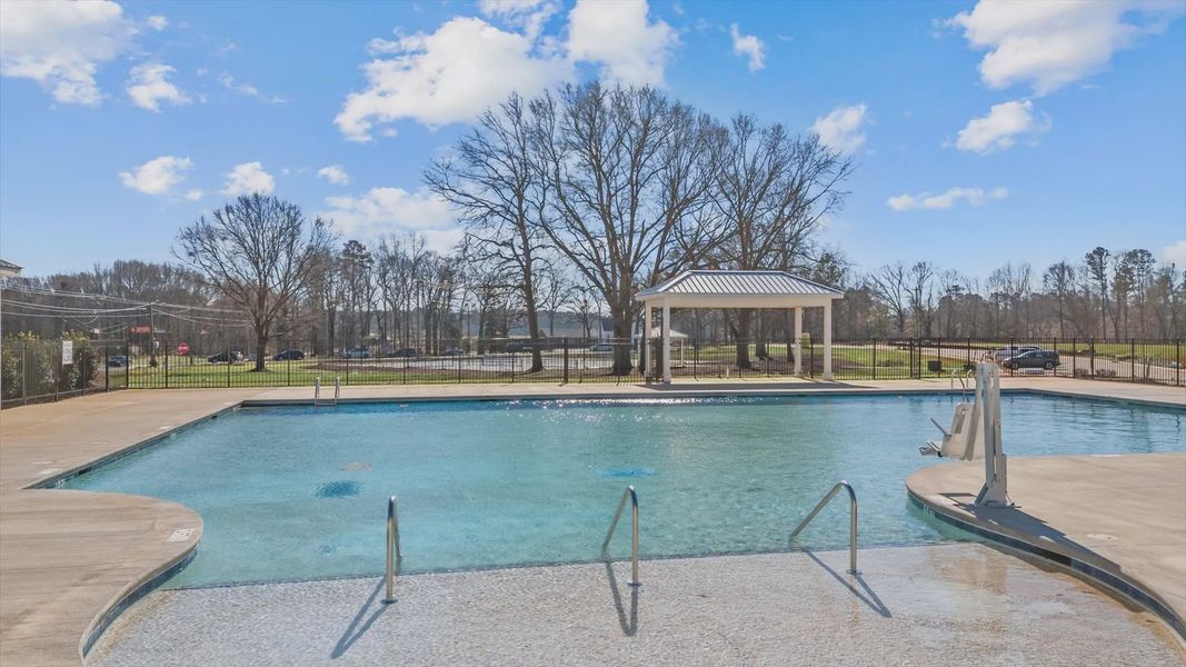 Pool with nature surroundings at the Village at Midway amenity center in Anderson, SC with pool and cabana Pool with nature surroundings at the Village at Midway amenity center in Anderson, SC with pool and cabana