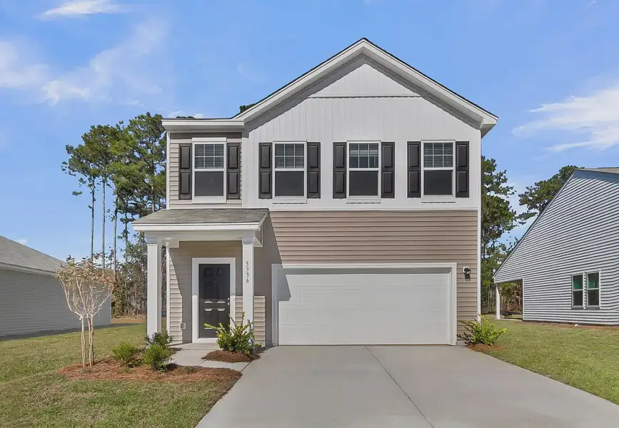 Front exterior of a home in the Pender Woods at Cane Bay community, located in Summerville, SC (Image 3).
