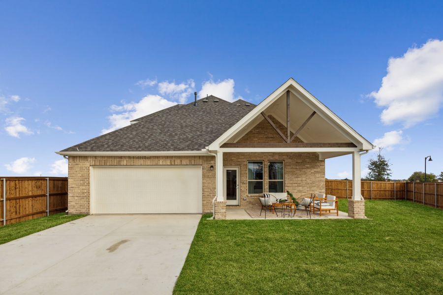 Front exterior of a home in the Dove Hollow community, located in Waxahachie, TX (Image 13).