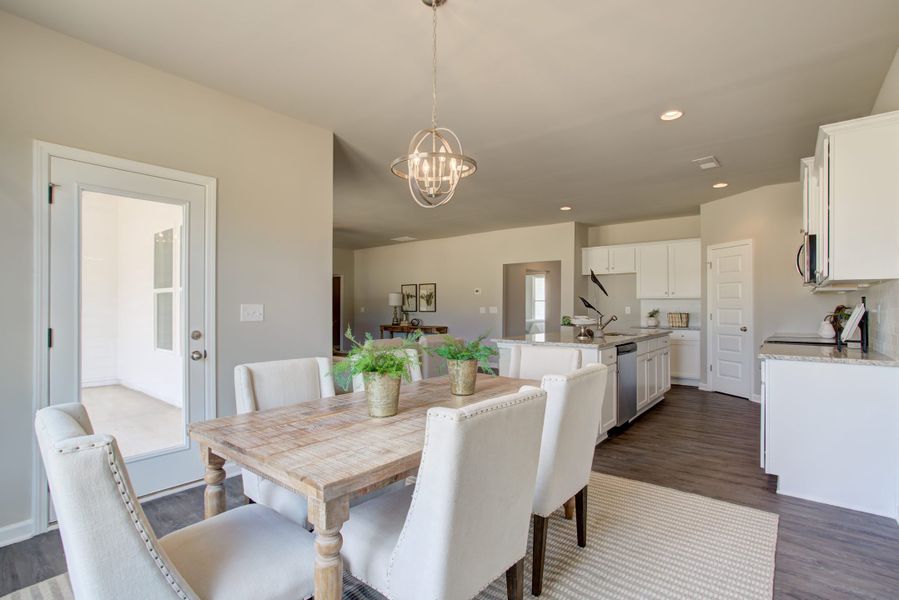 Furnished interior in a model home at Legends at Old Monroe in Monroe (Image 7).