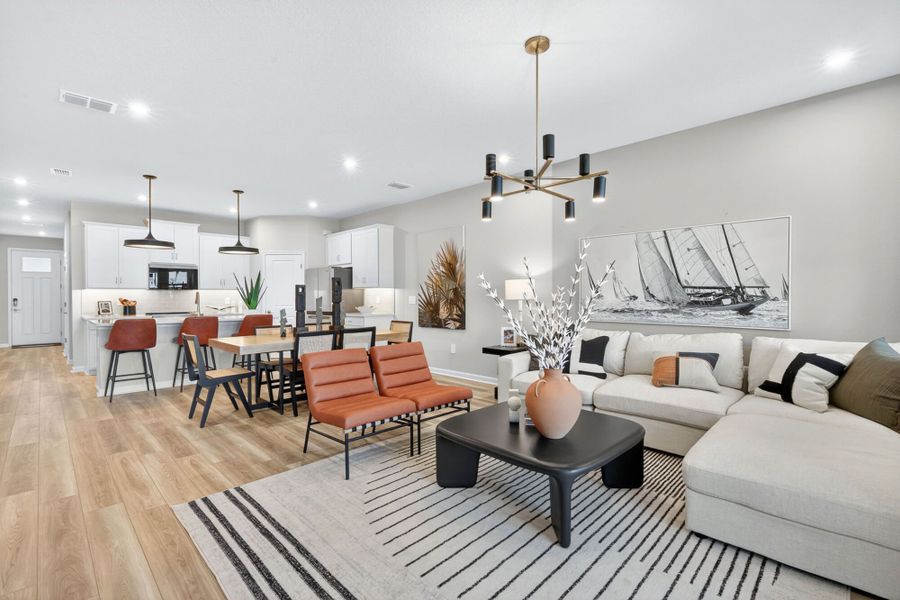 Furnished interior in a model home at Sun Bay Townes in Tampa (Image 7).