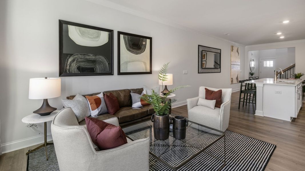 Furnished interior in a model home at The Meadows at Kinsley in Jamestown (Image 9).