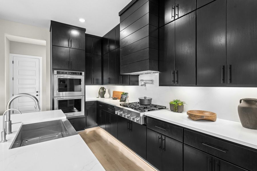 Furnished interior in a model home at Caliterra in Dripping Springs (Image 31).