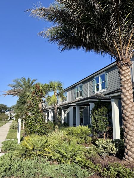 A modern home with lush landscaping and palm trees in Kindlewood Forest by D.R. Horton (Middleburg, FL). A modern home with lush landscaping and palm trees in Kindlewood Forest by D.R. Horton (Middleburg, FL).
