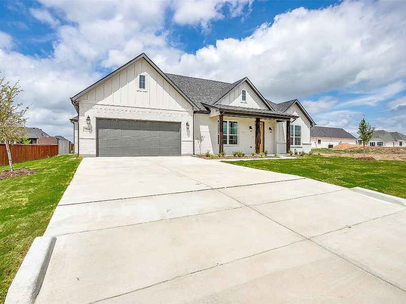 A showcase of a new construction home by Elmwood Custom Homes, highlighting their design and quality (Image 2).