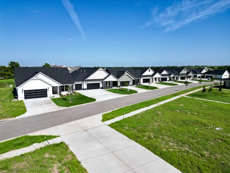 Front exterior of a home in the The Courtyards at The Moorings community, located in Wichita, KS (Image 3).