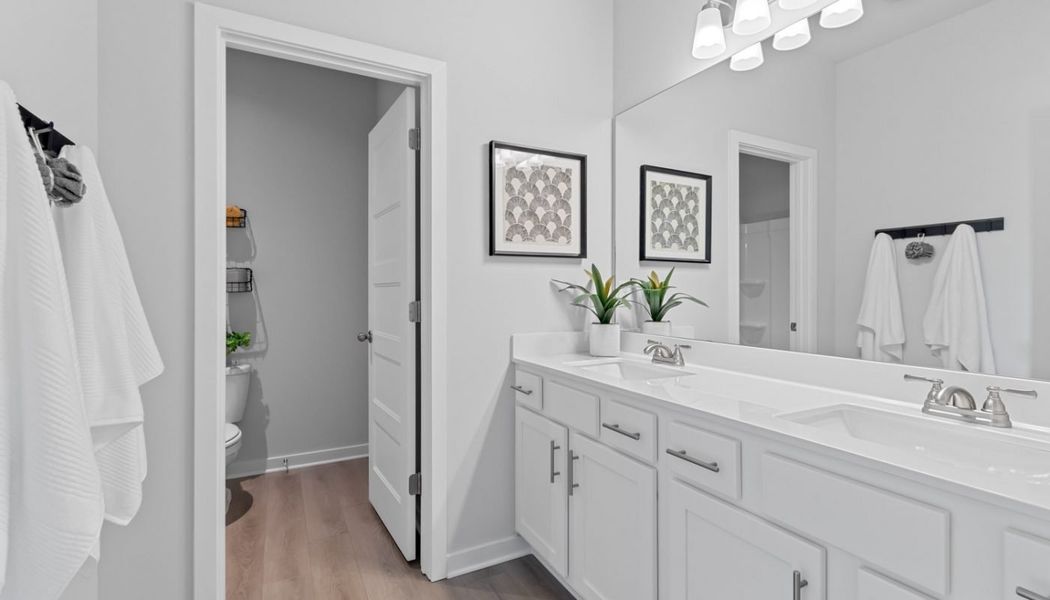 Furnished interior in a model home at Summerlin in Winder (Image 43).