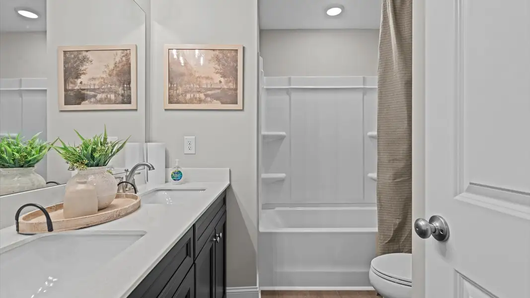 Furnished interior in a model home at Essex Townes in Franklinton (Image 14).