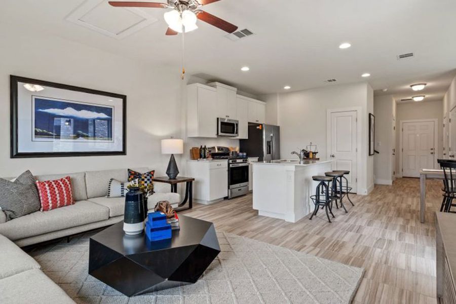 Furnished interior in a model home at Saddle Creek Twinhomes in Georgetown (Image 27).