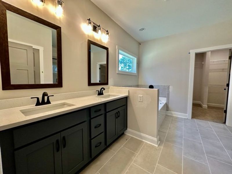 Furnished interior in a model home at Triple Park in Moreland (Image 6).