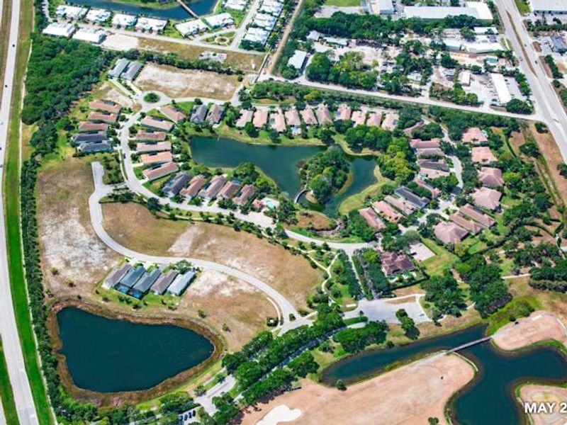 Aerial view of the The Falls at Grand Harbor community in Vero Beach, FL, showing layout and nearby surroundings (Image 29).