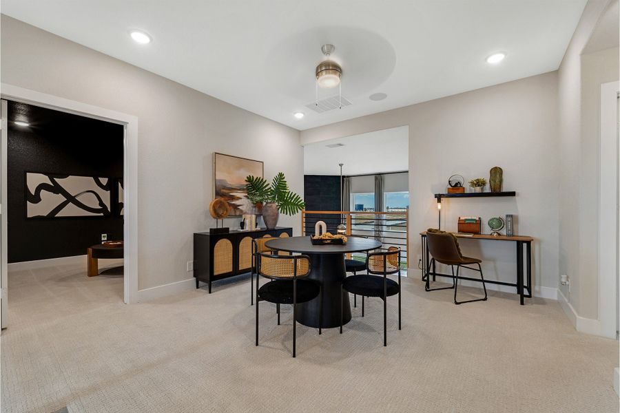 Furnished interior in a model home at Sunterra Lakes in Brookshire (Image 35).