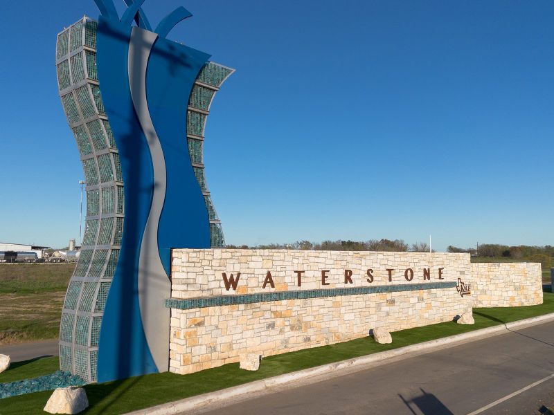 Entrance to the Waterstone Crossing community in Kyle, TX, featuring signage and landscaping (Image 2).