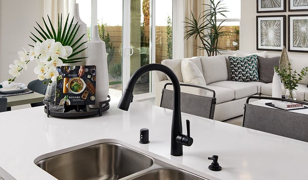 Furnished interior in a model home at Meridian at Star Valley in Tucson (Image 17).