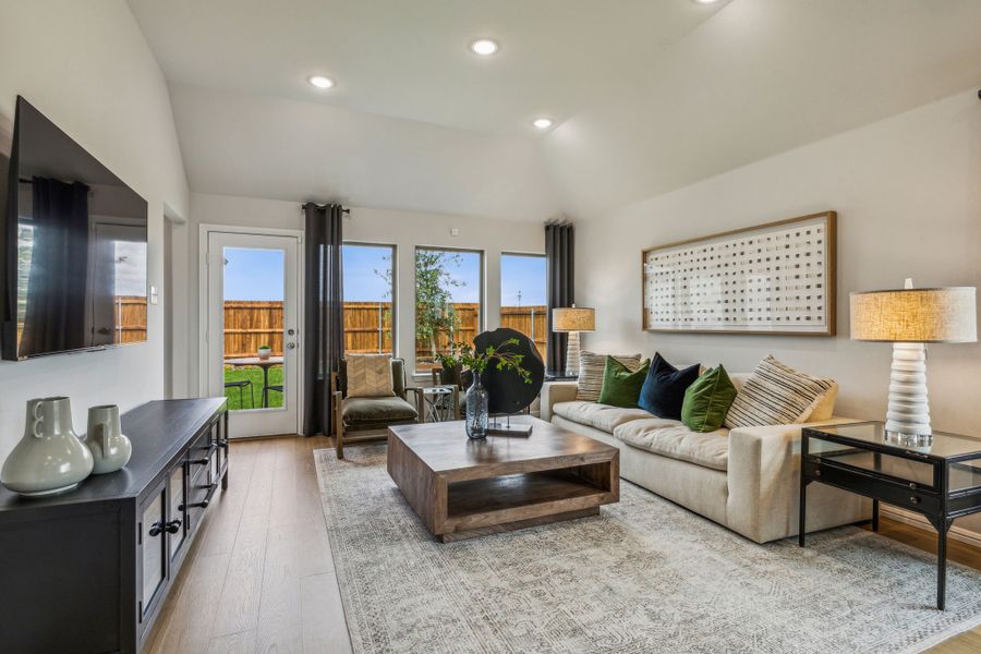 Living Room in a Stonehaven new Turquoise home in Seagoville TX by Trophy Signature Homes – REPRESENTATIVE PHOTO