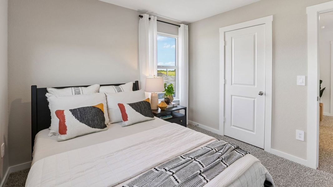 Furnished interior in a model home at Frontier in Mustang Ridge (Image 26).