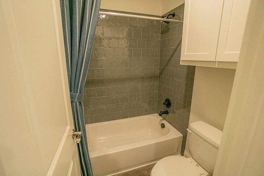 Furnished interior in a model home at Woodcreek in Fate (Image 22).