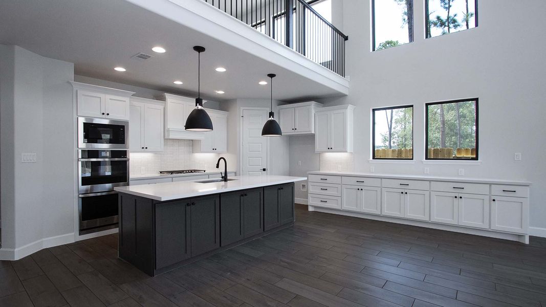 Furnished interior in a model home at Hidden Canyon 55' in San Antonio (Image 6).