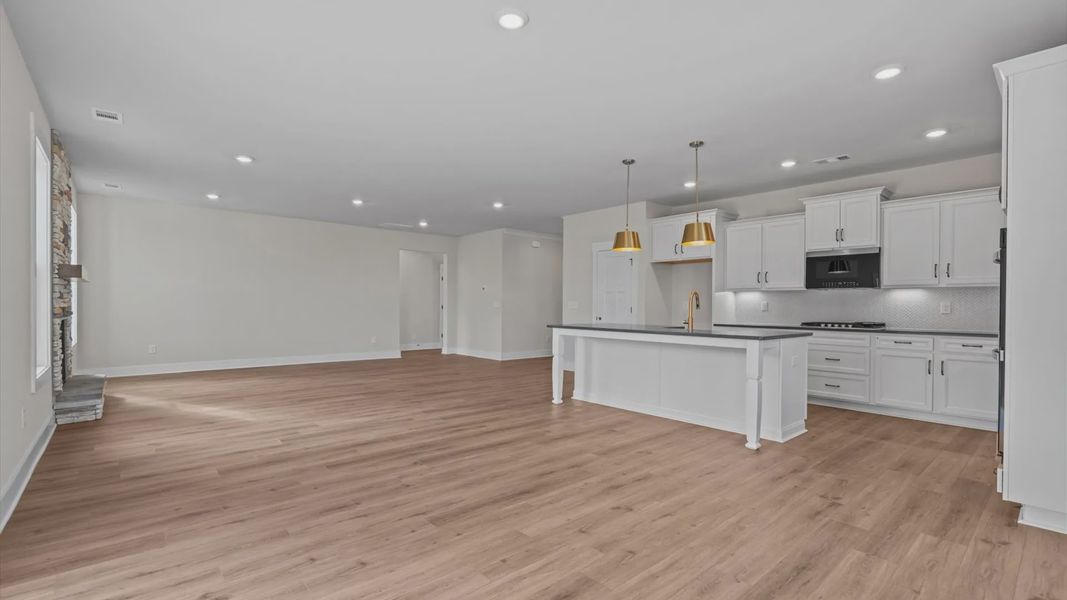 Family room in a blue and grey ranch style home