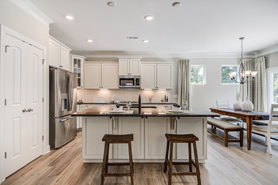 Furnished interior in a model home at Cottages at Piper Village in Trinity (Image 3).