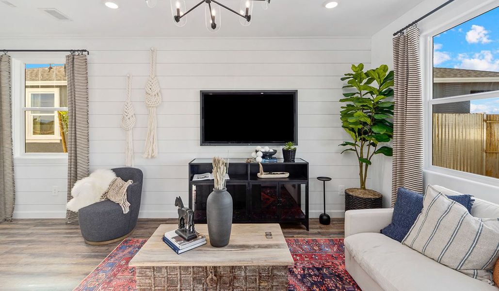 Furnished interior in a model home at Redford Estates in Tucson (Image 9).