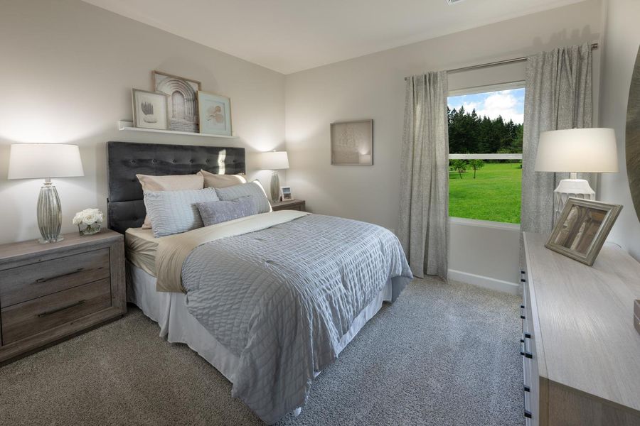 Furnished interior in a model home at Chatham Forest in Duncan (Image 12).