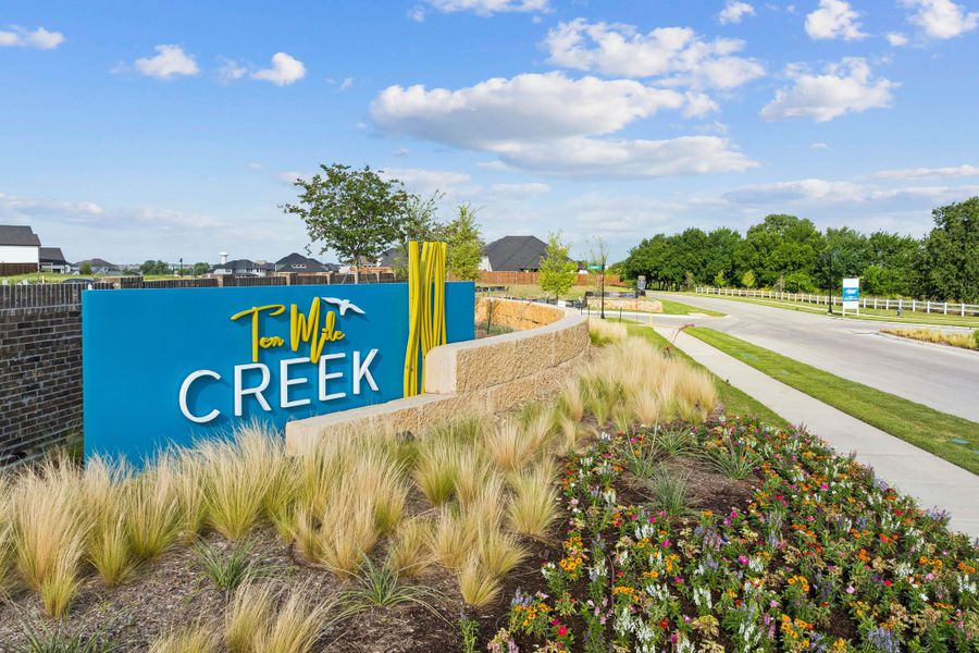 Entrance to the Ten Mile Creek community in Celina, TX, featuring signage and landscaping (Image 2). Entrance to the Ten Mile Creek community in Celina, TX, featuring signage and landscaping (Image 2).