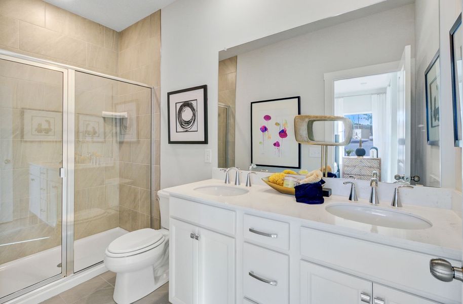 Spa-inspired bathrooms with modern finishes and timeless design