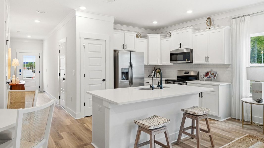Furnished interior in a model home at Palm Street Townhomes in Destin (Image 6).