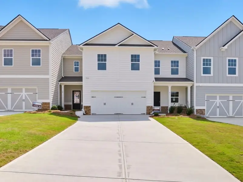 Front exterior of a home in the The Retreat at Browns Ridge community, located in Newnan, GA (Image 2).