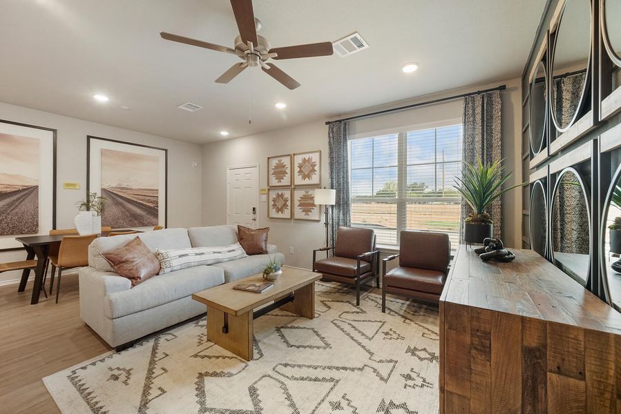 Furnished interior in a model home at Seven Oaks Townhomes in Tomball (Image 23).