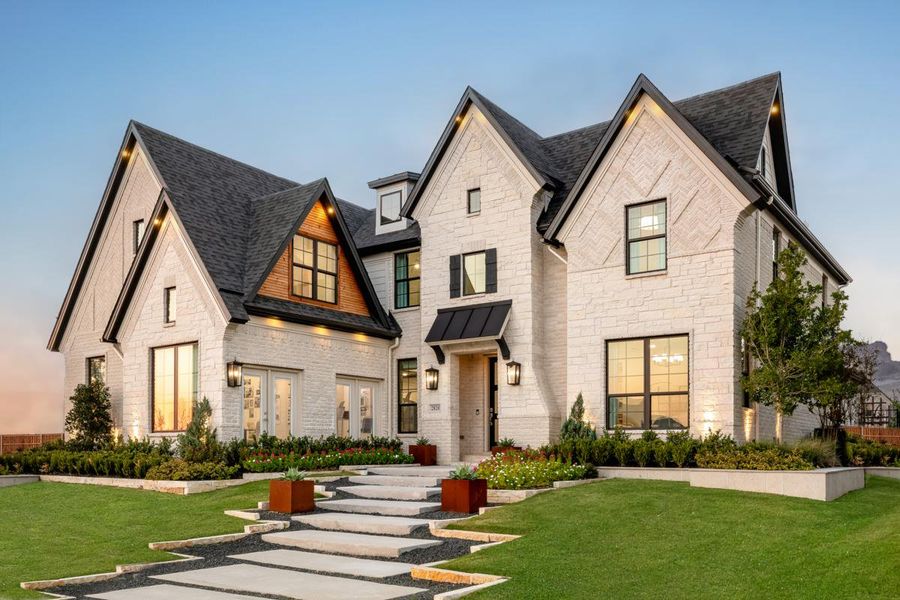 Front exterior of a home in the Creekside at Elevon community, located in Lavon, TX (Image 8).