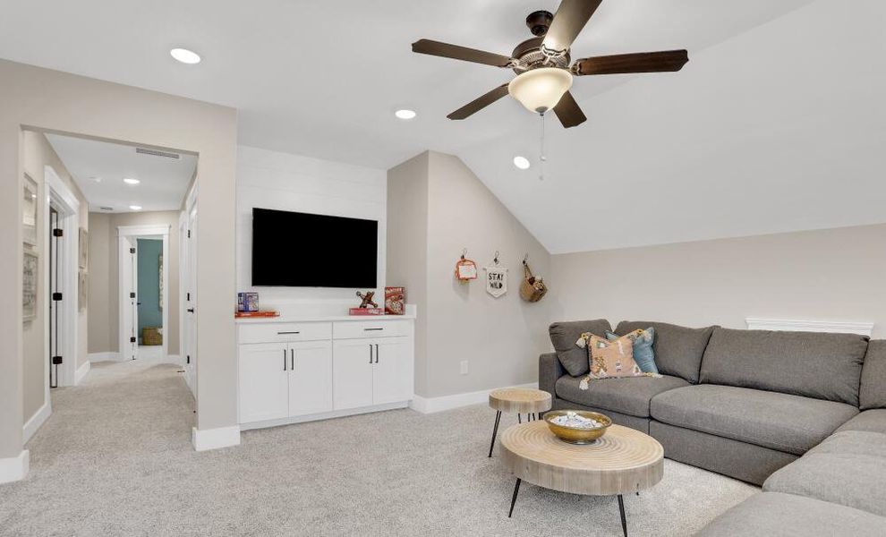 Furnished interior in a model home at Enclave at Riverdale in Huntersville (Image 31).