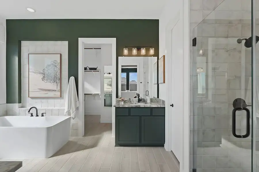 Furnished interior in a model home at Brookewater 60's in Rosenberg (Image 35).