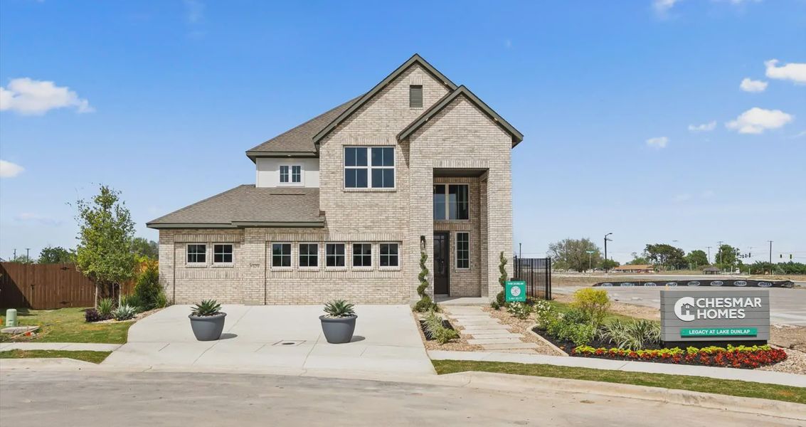 Front exterior of a home in the Legacy at Lake Dunlap community, located in New Braunfels, TX (Image 3).