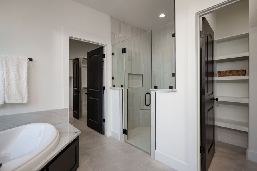 Furnished interior in a model home at Greens Prairie Reserve in College Station (Image 21).