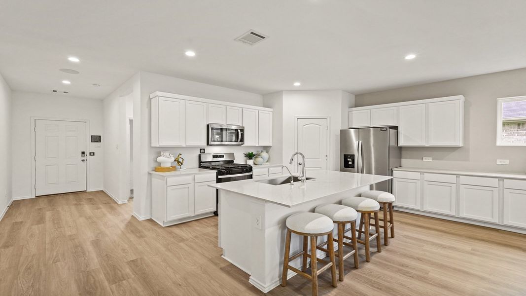 Furnished interior in a model home at Newport Pointe in Crosby (Image 7).