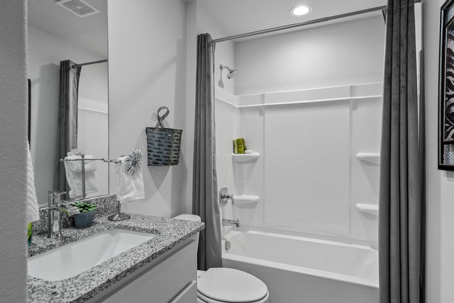 Furnished interior in a model home at Faculty Row in Abilene (Image 30).