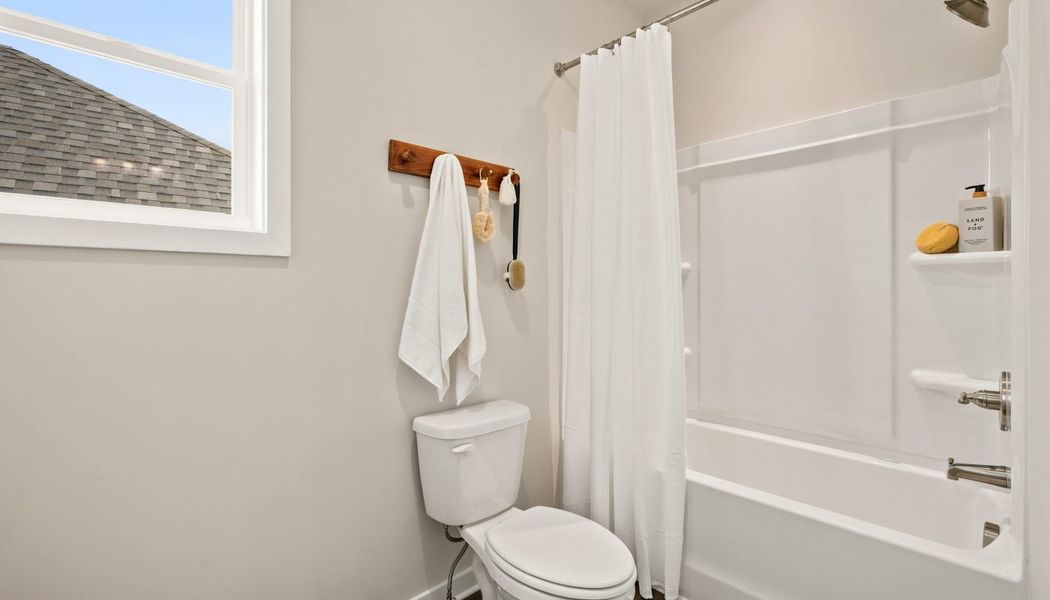 Furnished interior in a model home at Fowler Farms in Auburn (Image 100).