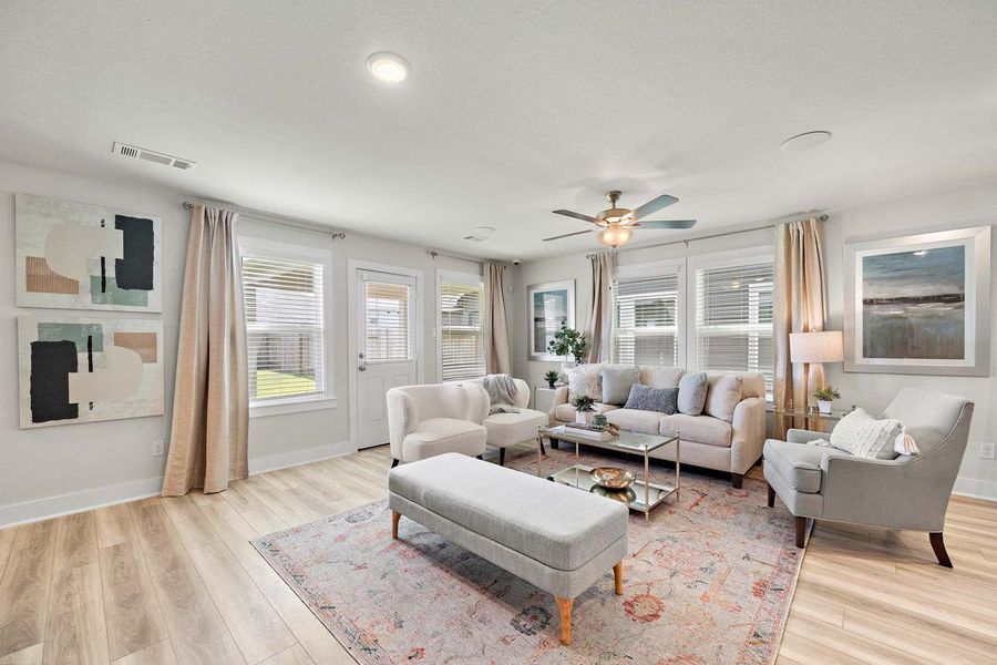 Furnished interior in a model home at Haven at Kieth Harrow in Cypress (Image 6).