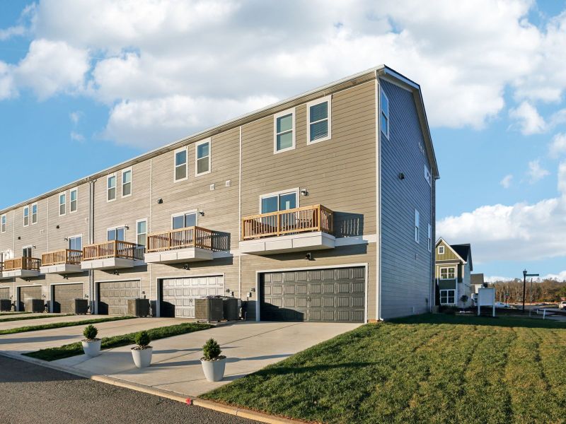 Front exterior of a home in the Greystone - Highland Townhomes community, located in Smyrna, TN (Image 2).