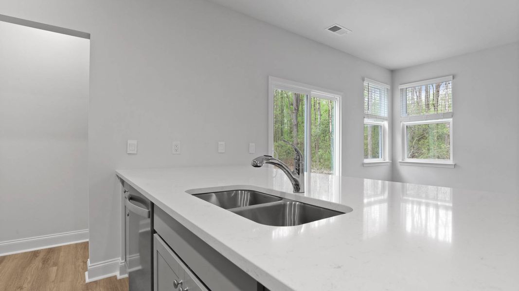 Furnished interior in a model home at Rivers Reach in Yemassee (Image 6).