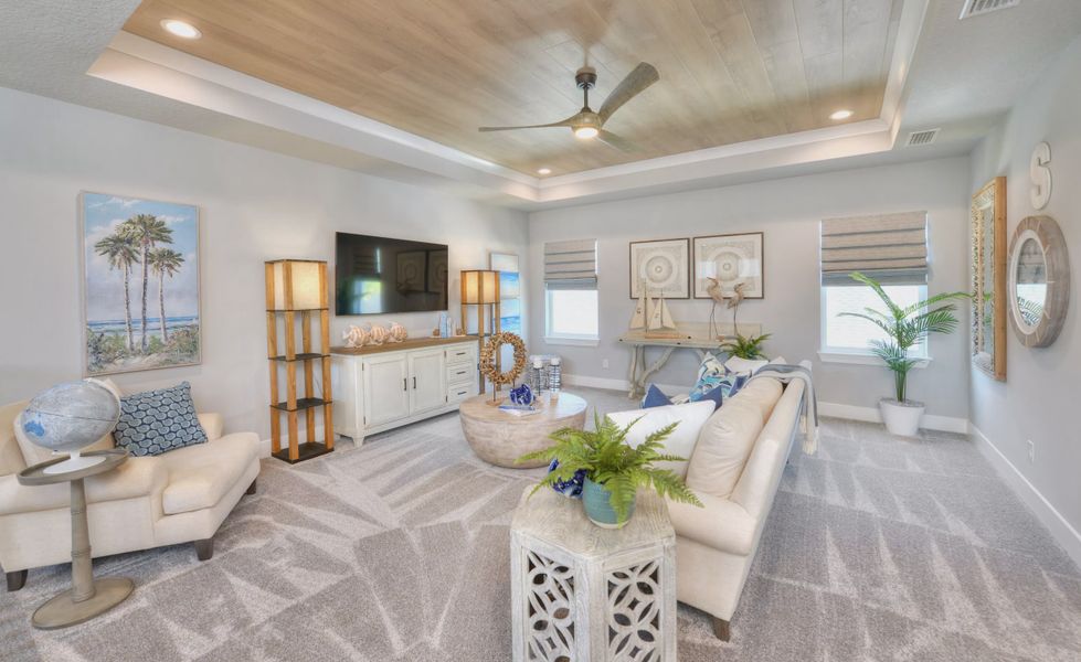 Furnished interior in a model home at Woodhaven Single Family in Port Orange (Image 7).