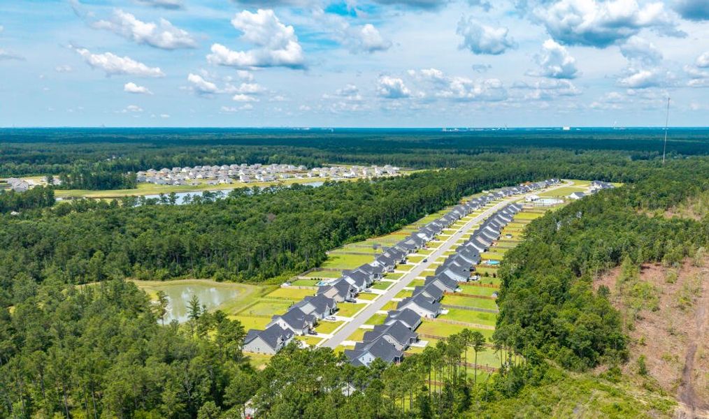 Aerial view of the The Enclave at French Quarter Creek community in Huger, SC, showing layout and nearby surroundings (Image 11).