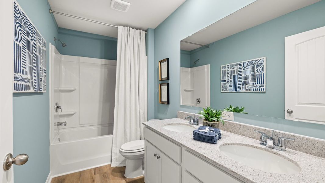 Furnished interior in a model home at Liberty Crossing in Braselton (Image 20).