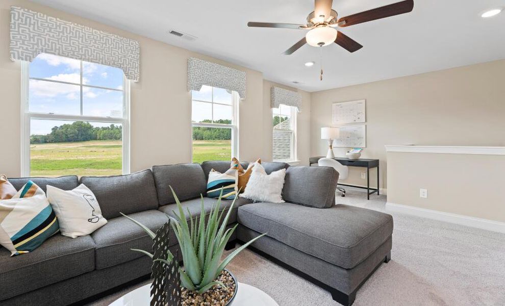 Furnished interior in a model home at Hayes Village in Greensboro (Image 14).
