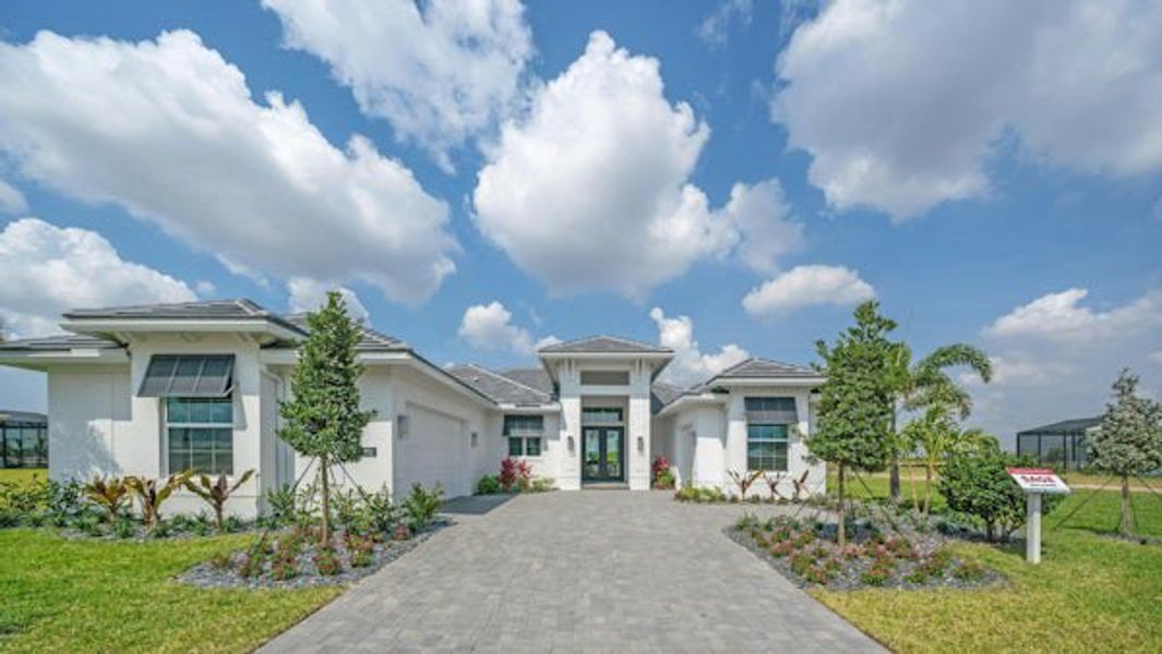 Front exterior of a home in the BELTERRA community, located in Port St. Lucie, FL (Image 58).