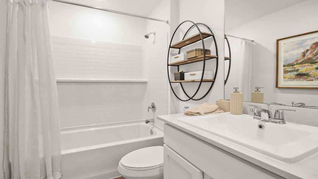 Furnished interior in a model home at New Waverly Station in New Waverly (Image 25).