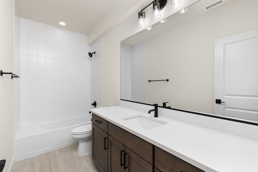 Sterling Ranch Homestead - American Legend Homes Model Home - Secondary Bathroom Sterling Ranch Homestead - American Legend Homes Model Home - Secondary Bathroom